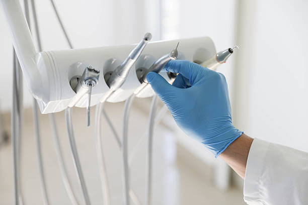 Professional Tooth Extraction technician working in Clinton, WA
